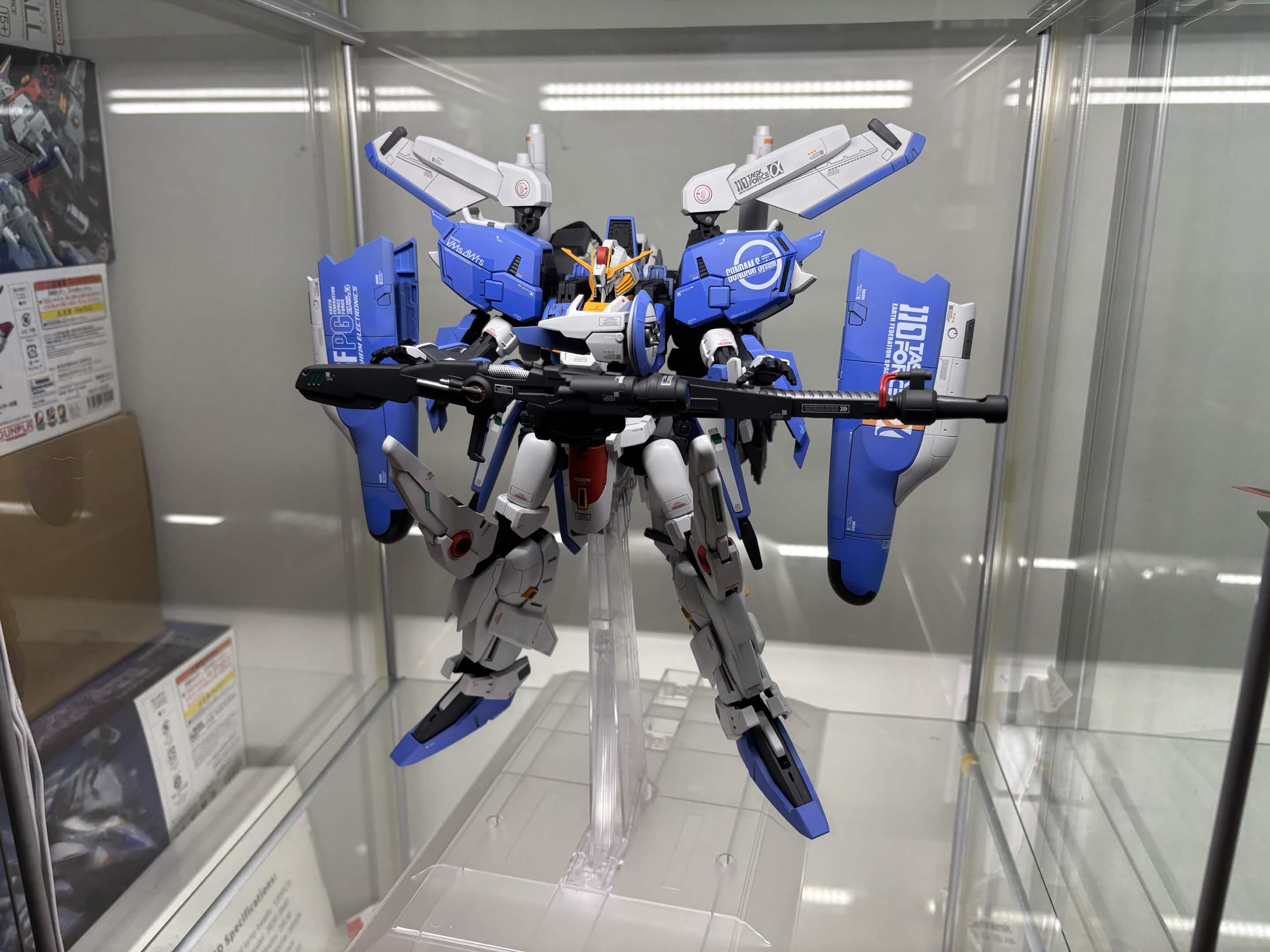 My blue and white Gunpla model on display